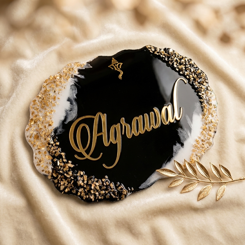 Custom resin name plate in black and gold with Agrawal family name and glossy finish